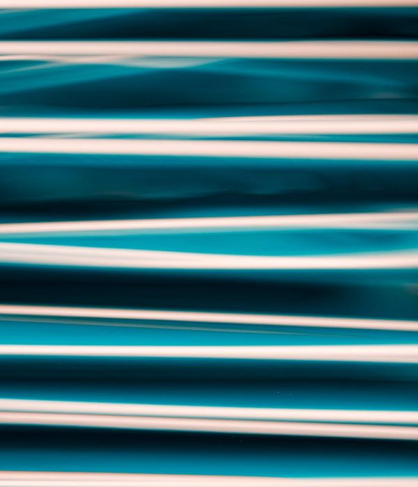 Abstract glowing lines representing calm breathing flow